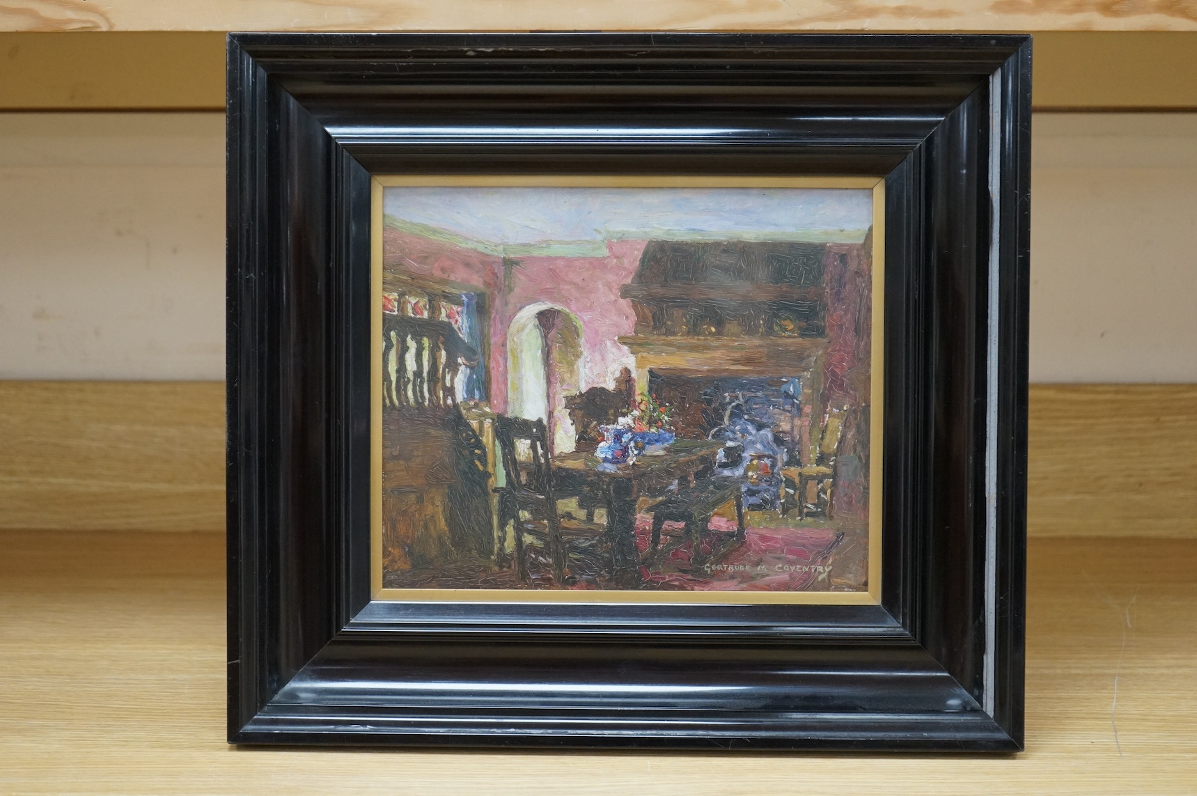 Gertrude Mary Coventry (Scottish 1886-1964), oil on board, Cottage interior, signed, 24 x 30cm, ebonised frame. Condition - craquelure throughout, section of frame broken